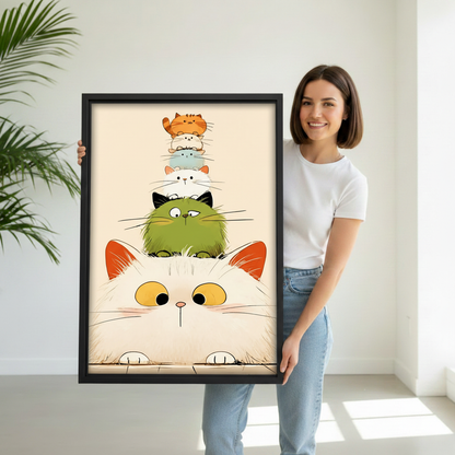 Woman holding cute stacked cats framed print, black frame, funny cat tower wall art, home decor gift