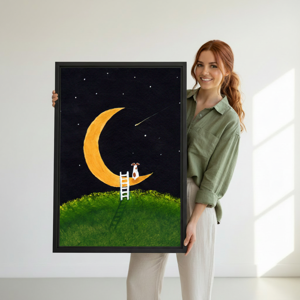 Hand holding a whimsical framed canvas wall art print featuring a dog climbing a ladder to the crescent moon under a starry night sky