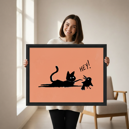 Hey! black cat and bird funny wall art — framed canvas print shown in a cozy bedroom setting