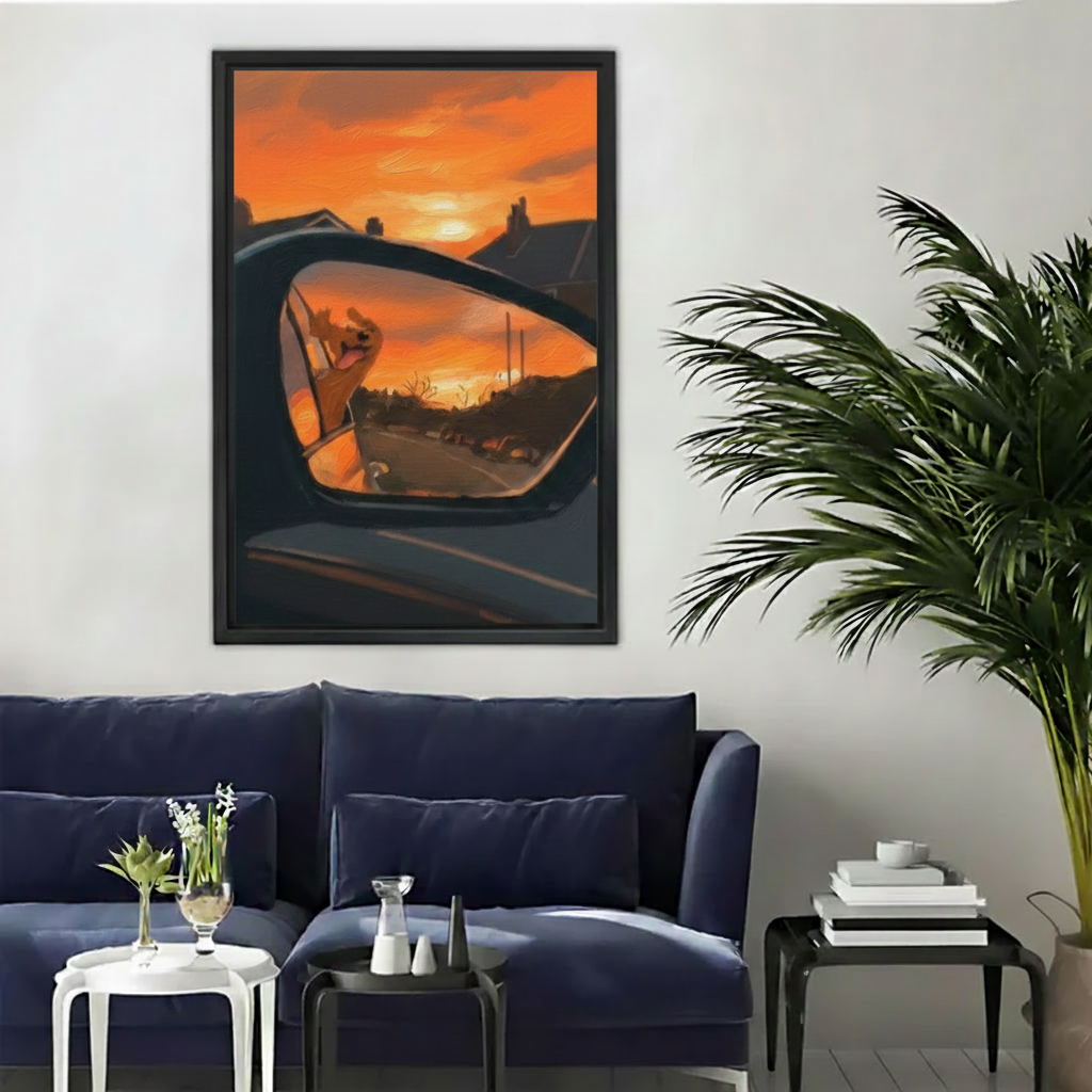 Dog in car side mirror sunset framed canvas print on white wall above a dark blue sofa — road trip wall art