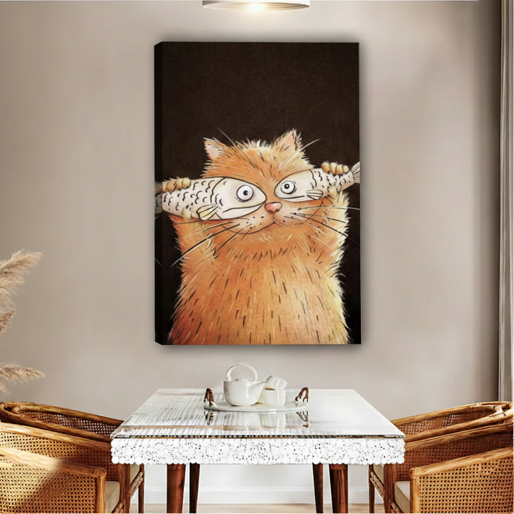 Orange cat holding fish wall art in thick black frame dining room decor