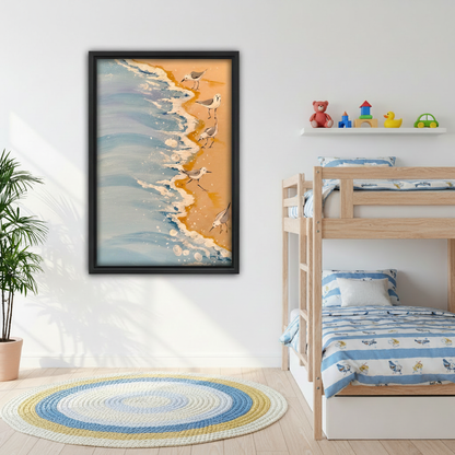 Sandpiper shorebirds on sandy beach with ocean waves framed wall art, black frame, warm golden sand coastal oil painting style, styled on white wall in a cheerful kids bedroom with bunk beds and colorful round rug