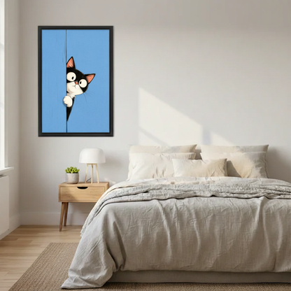 Cartoon tuxedo cat framed print displayed in cozy bedroom above nightstand
