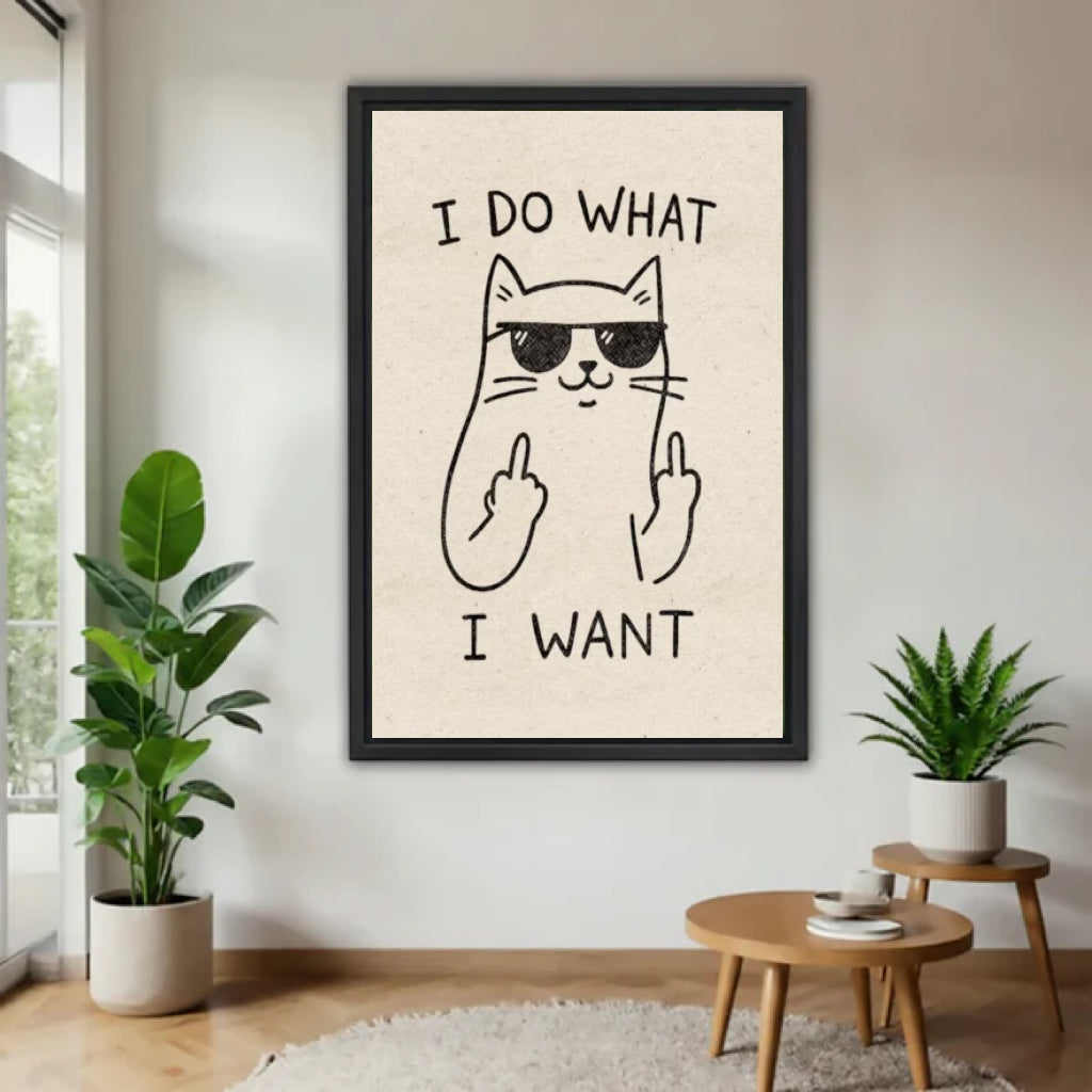 Funny cat I do what I want sunglasses middle finger humorous wall art print in black frame on white wall with fiddle leaf fig and round oak side table in minimalist living room