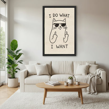 Sassy cat wearing sunglasses I do what I want funny minimalist line art wall art print in black frame above cream sofa with oval oak coffee table succulent and plaid throw in Scandinavian living room