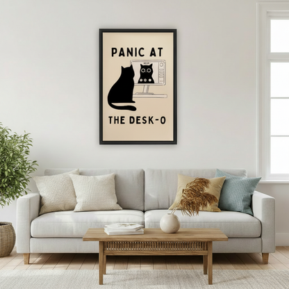 Humorous black cat panic at the desk-o office computer funny minimalist wall art print in black frame above light grey sofa with oak coffee table and pampas grass vase in Scandinavian living room