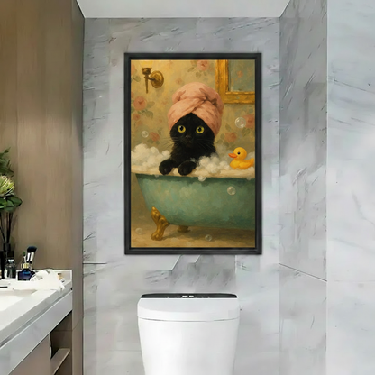 Funny black cat in bathtub with towel on head framed wall art print, black frame, vintage floral oil painting style with rubber duck, hung above toilet in a luxury marble bathroom with warm gold accents