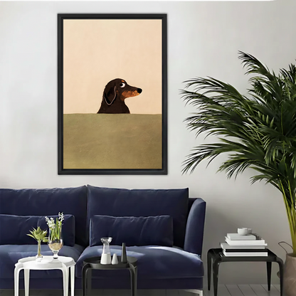 Minimalist dachshund framed wall art print displayed above navy sofa in modern living room