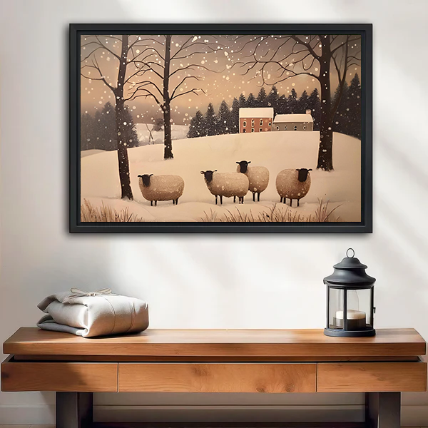 Rustic winter sheep canvas wall art featuring four sheep in a snowy landscape, black-framed above a cream sofa.