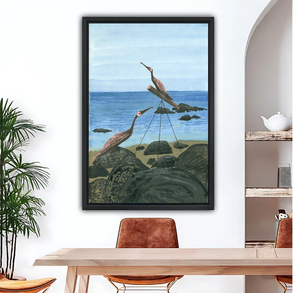 Coastal heron birds oil painting canvas wall art in black frame above wooden dining table in bright modern room