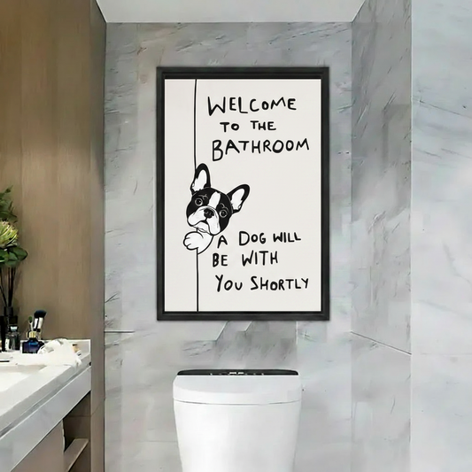 Funny French Bulldog bathroom wall art print in black frame above toilet in marble bathroom