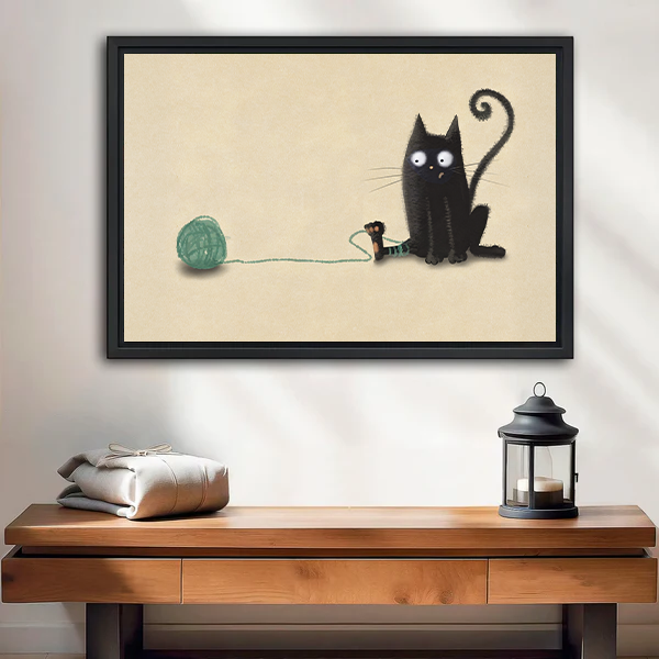 Cute black cat yarn ball framed canvas wall art – whimsical minimalist print above entryway table