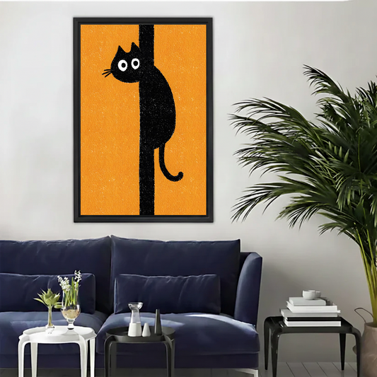 Funny black cat gripping pole cartoon orange pop art framed canvas wall art above navy blue sofa in modern living room