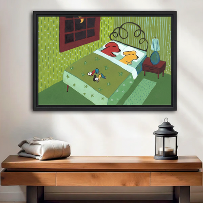 Whimsical dogs stole the bed framed canvas wall art, red and yellow dogs sleeping in bed, two tiny people at foot, moonlit retro green bedroom illustration, black frame, hung above wooden console table with lantern