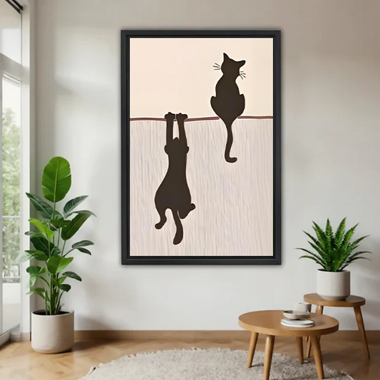 Funny two black cats hanging silhouette minimalist framed canvas wall art in modern living room with plants