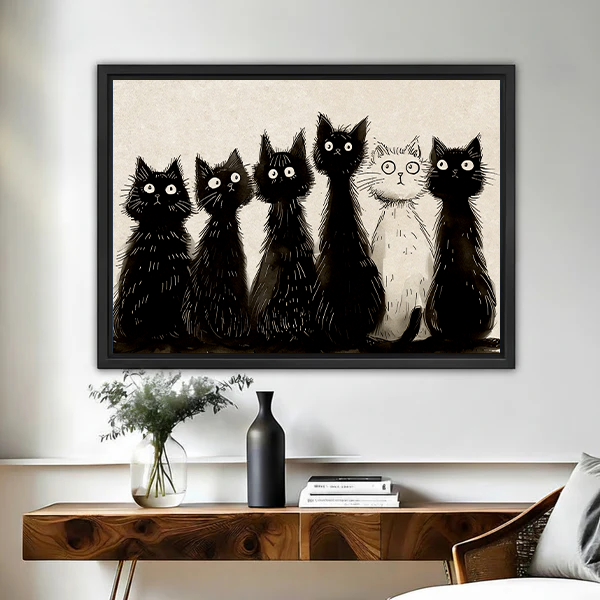 Framed quirky black and white cats sketch minimalist wall art print above wooden console table