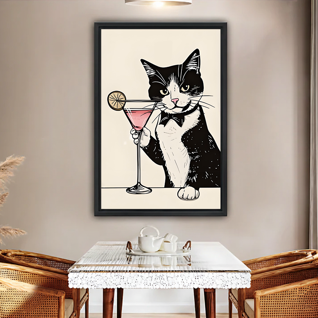 Tuxedo cat martini minimalist line art framed canvas wall art in black frame above glass dining table with rattan chairs