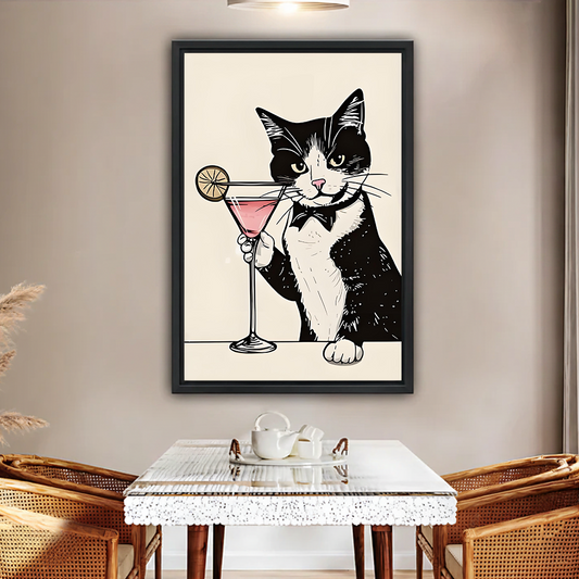 Tuxedo cat martini minimalist line art framed canvas wall art in black frame above glass dining table with rattan chairs