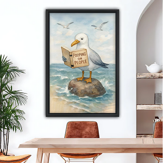 Funny seagull reading book framed wall art print hanging in dining room above wooden table