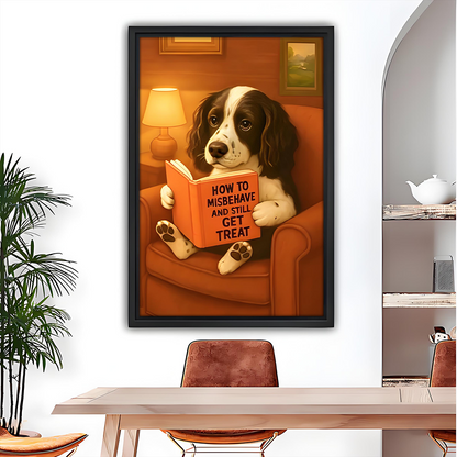Funny dog reading vintage wall art print in black frame above dining table with spaniel holding How to Misbehave book