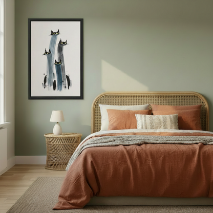Minimalist black cat watercolor framed canvas print on sage green bedroom wall beside rattan bed