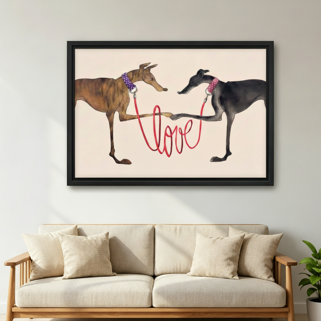 Two greyhounds with red love leash framed art print, black frame, whimsical dog love illustration cream background, hung above a cream linen sofa in a bright Scandinavian living room with indoor plant and wooden armchair