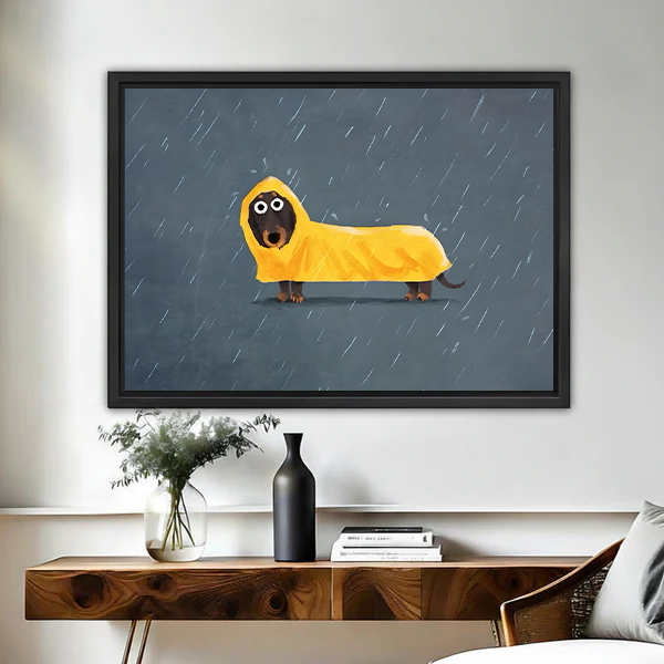 Funny dachshund in yellow raincoat framed canvas wall art above wooden console table