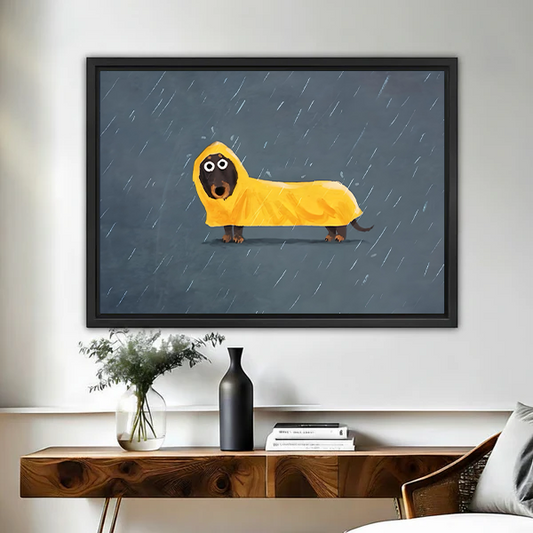 Funny dachshund in yellow raincoat framed canvas wall art above wooden console table