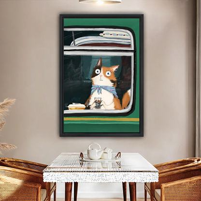 Framed whimsical cat on train wall art print hanging in a cozy dining room with rattan chairs