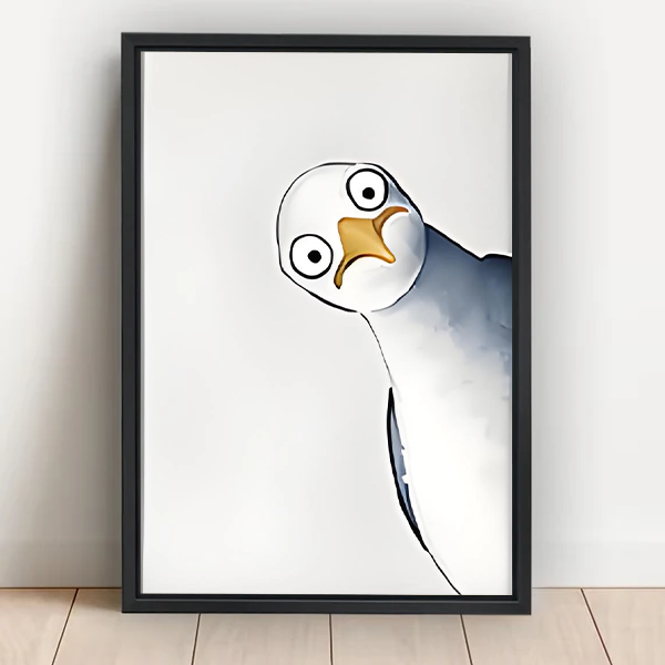 Tilted seagull close-up watercolor framed canvas wall art with round eyes and yellow beak leaning against white wall on light wood floor