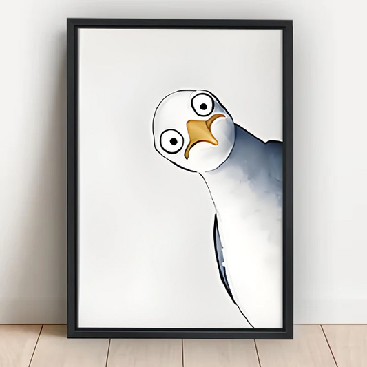 Tilted seagull close-up watercolor framed canvas wall art with round eyes and yellow beak leaning against white wall on light wood floor