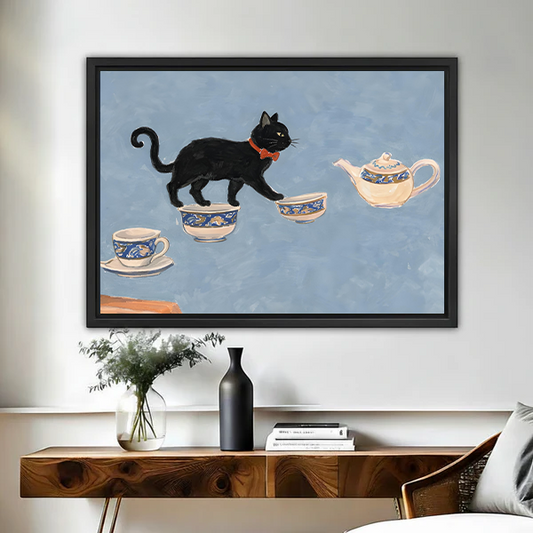 Framed black cat tea party wall art print hanging above wooden console table