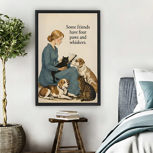Woman in blue floral dress sitting on floor holding black cat surrounded by beagle dog tabby cat and golden retriever vintage watercolor illustration with some friends four paws whiskers quote framed wall art hung on white wall above rustic wooden stool with stacked books beside teal bedding in cozy bedroom