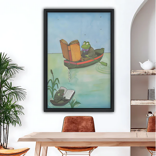 Reading frog watercolor framed wall art print hanging in modern dining room above wooden table