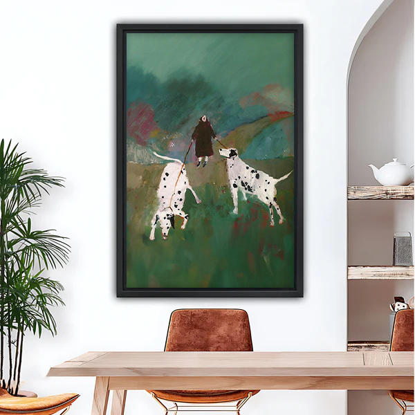 Woman walking two Dalmatians in green field expressive oil painting framed canvas wall art in black frame above wooden dining table with leather chairs and arched wall