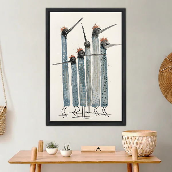 Five tall abstract blue grey tribal birds with red fluffy crests long pointed beaks and dot texture patterns folk art hand-drawn illustration on aged cream background framed wall art hung on light grey wall above natural wood console table with small white ceramic pots succulents wooden laptop stand and woven rattan wall basket