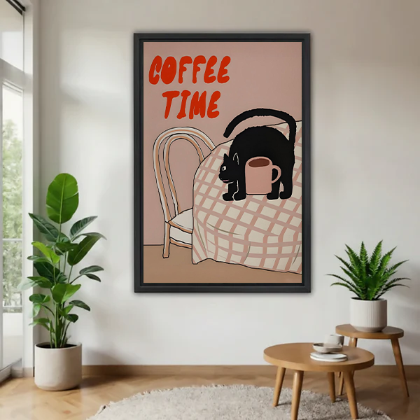 Woman holding framed Coffee Time black cat canvas wall art featuring red lettering, a pink mug, and checkered tablecloth.