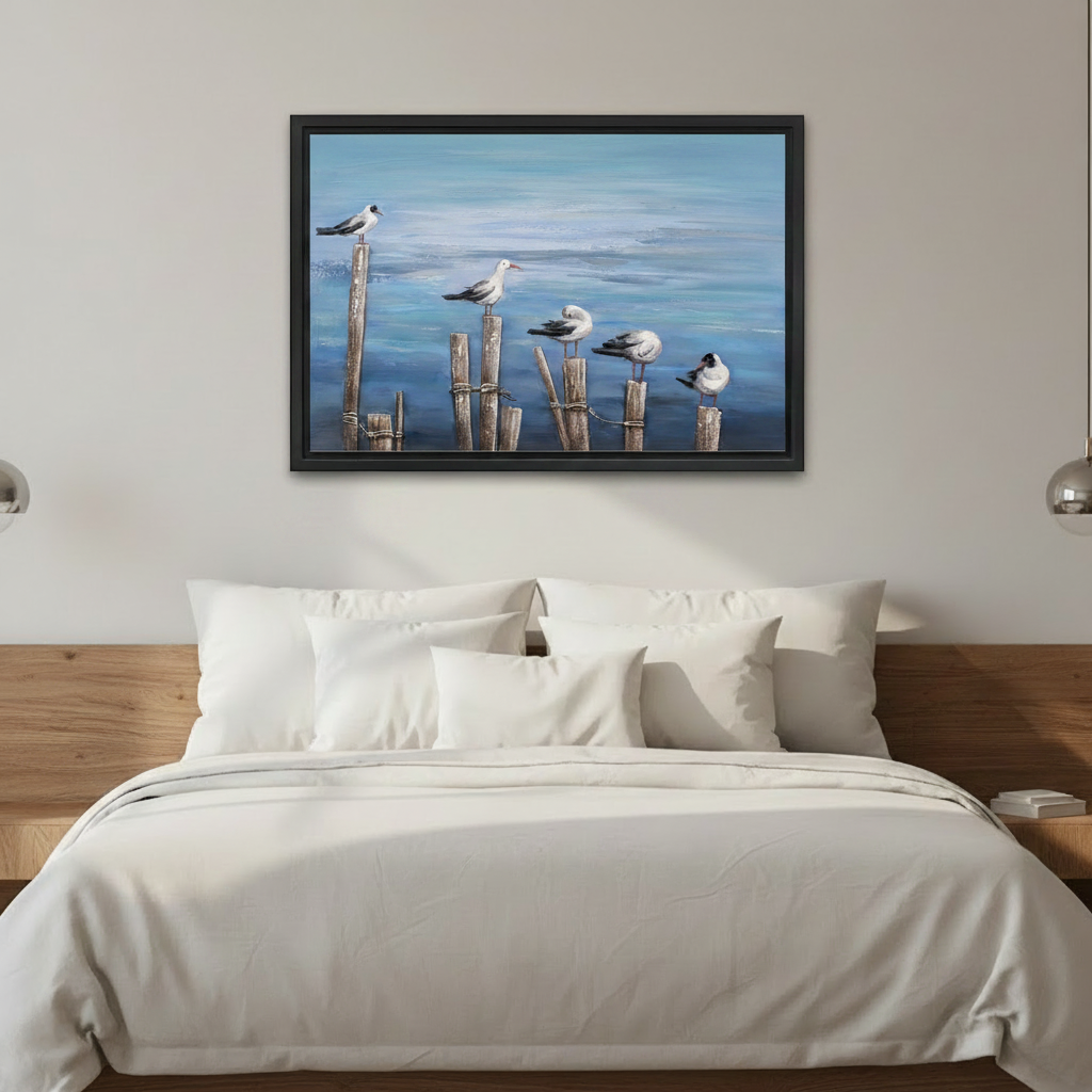 Seagulls on pier coastal oil painting framed canvas wall art above bed in relaxed coastal bedroom, ocean-inspired decor