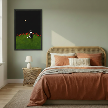 Minimalist black and white cat moonlit garden canvas wall art – black frame, moody night sky illustration, styled in warm Scandinavian bedroom with neutral tones