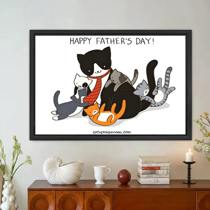 Happy Father's Day funny cat family framed wall art with black and white dad cat in red tie surrounded by four kittens hung above wooden sideboard with white ceramic decor