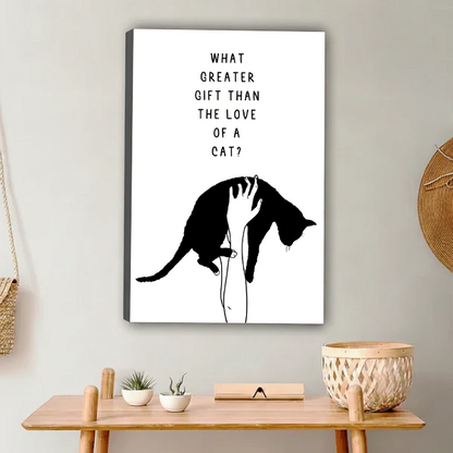 What greater gift than the love of a cat minimalist black and white cat quote gallery wrap canvas art displayed on grey wall above wooden console table with succulents and rattan basket

