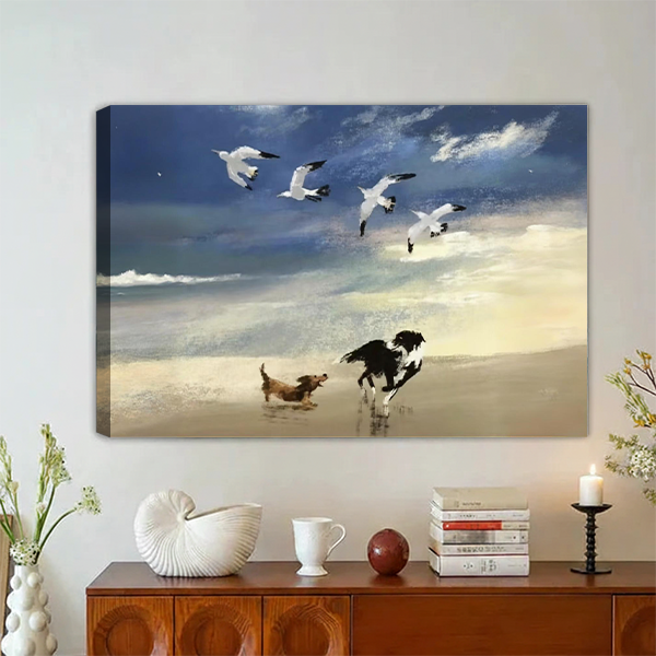 Unframed gallery wrap canvas of dogs chasing seagulls on coastal beach
