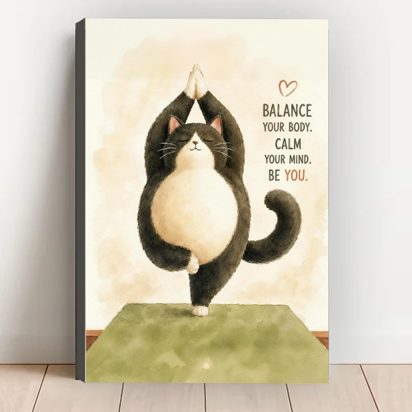 Yoga cat motivational quote gallery wrap canvas art leaning against white wall on light wood floor