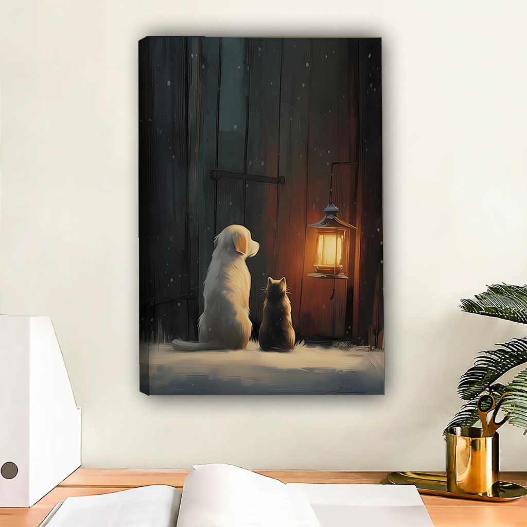 Dog and cat winter night lantern gallery wrap canvas art with warm amber glow displayed above wooden desk with gold accessories in modern workspace