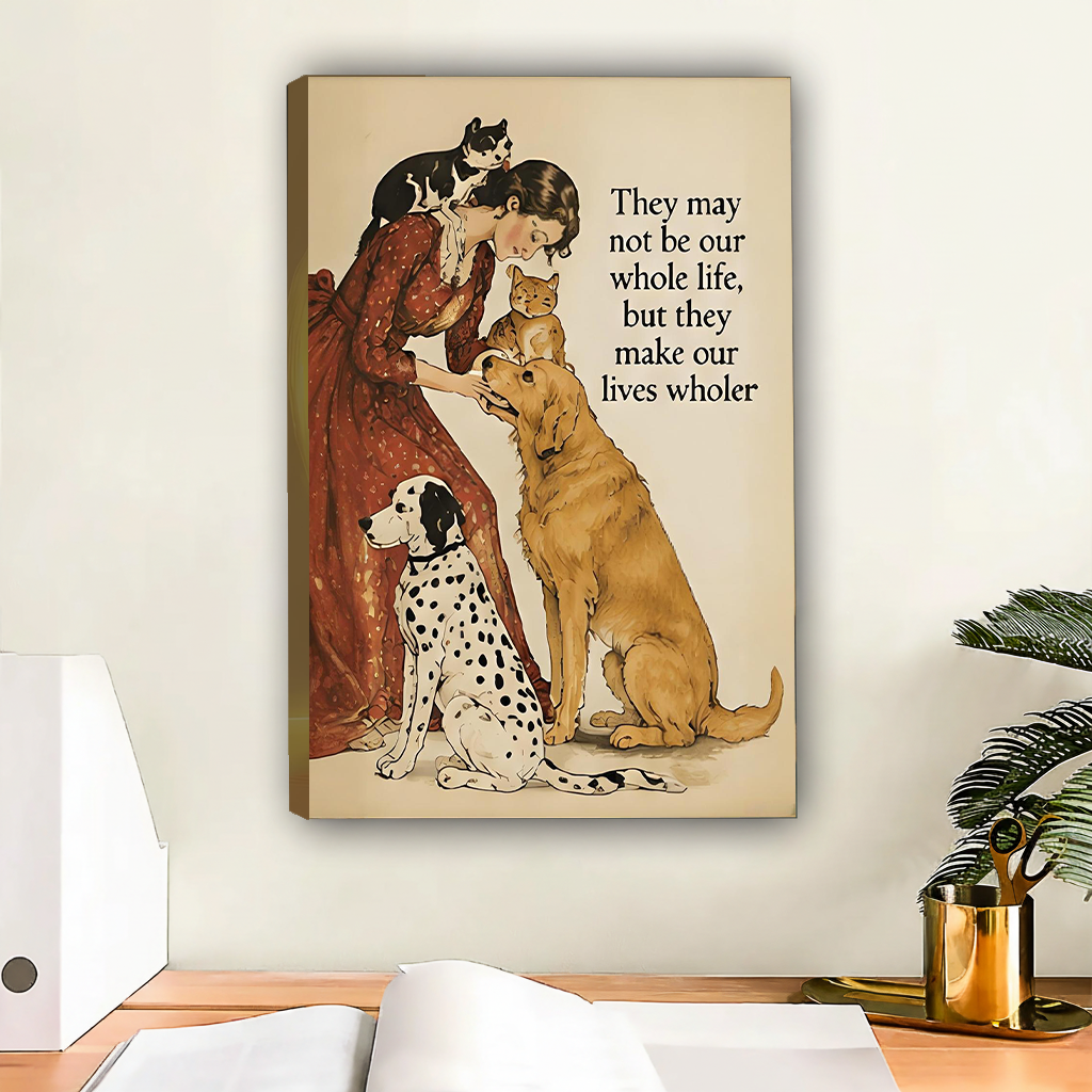 Woman in red floral dress bending to kiss orange cat with black white cat on her head golden retriever and dalmatian sitting beside her vintage watercolor illustration with lives wholer quote gallery wrap canvas art displayed on white wall above wooden desk with white binder open notebook and gold mug beside palm plant