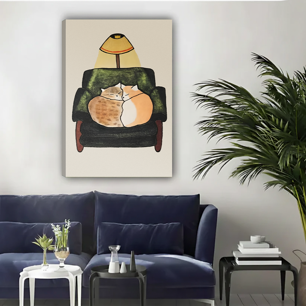 Two cats curled up in green chair under lamp whimsical illustration gallery wrap canvas wall art above navy blue sofa
