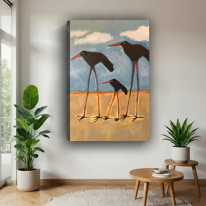 Two tall shorebirds with baby bird beach oil painting gallery wrap canvas art without frame on white wall with tropical plants