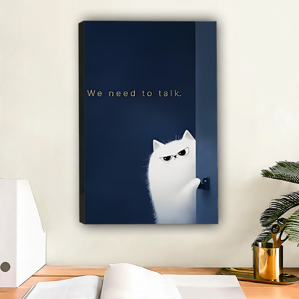 Grumpy white cat "We need to talk" gallery wrap canvas art above wooden desk in home office