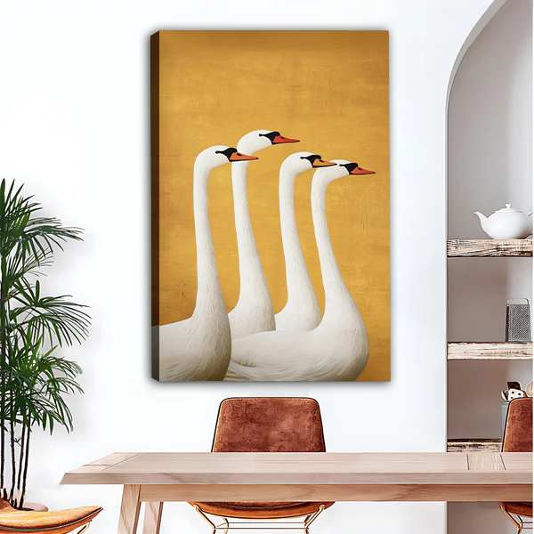 Woman holding elegant swan quartet golden framed canvas wall art, large size luxury white swan print for home decor