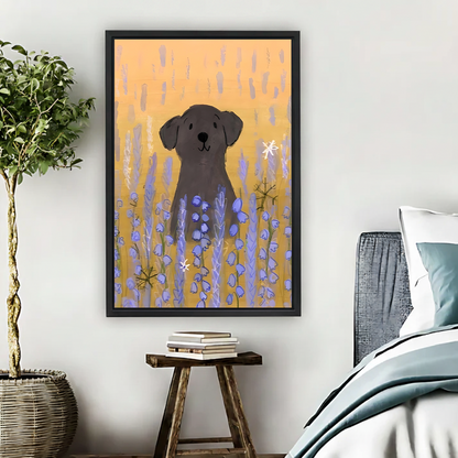 Black labrador dog sitting in purple bluebell flower field with warm orange background boho hand-painted illustration framed wall art hung on white wall above rustic wooden stool with stacked books beside teal bedding and wicker basket plant